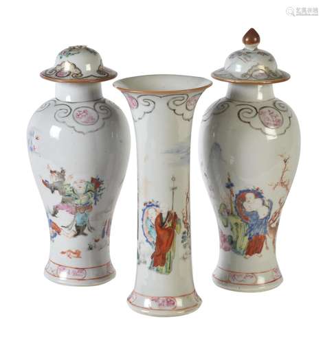 A group of three famille rose 'Eighteen Monks' vases from a garniture