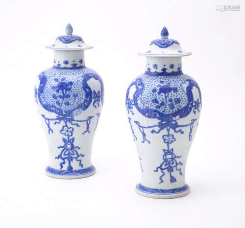 A pair of Chinese 'Shipwreck' blue and white vases and covers