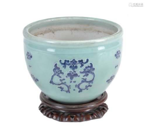 A Chinese blue and white celadon-ground jardinière