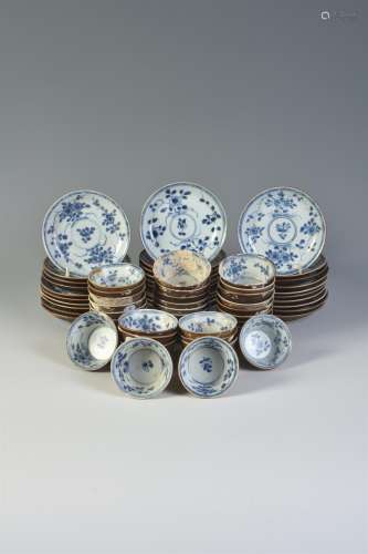 Thirty-two Ca Mau 'Wild Cherry' shipwreck blue and white tea bowls and thirty saucers