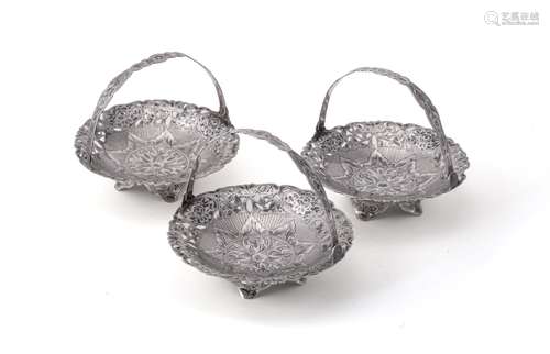 A set of three graduated silver and niello sweet baskets