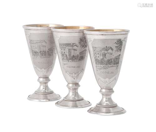 A set of three Soviet Russian silver coloured Vodka tots