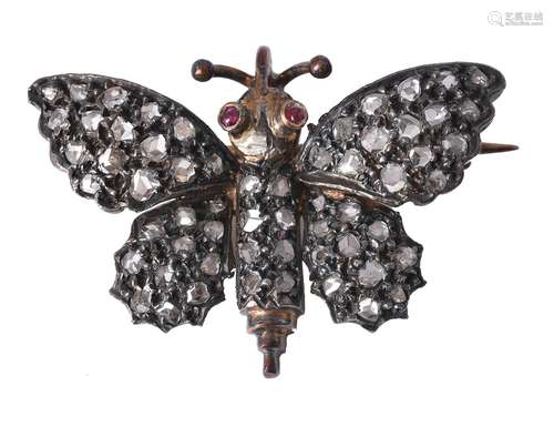 A diamond butterfly brooch