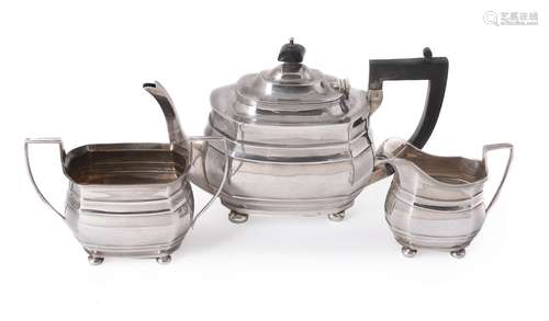 A silver shaped oblong baluster tea set by S. Blanckensee & Son Ltd.