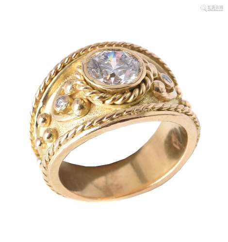 A gold coloured diamond ring