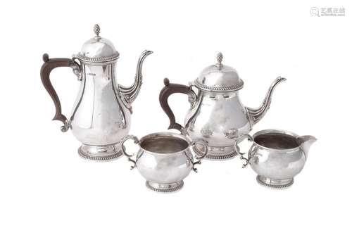 A silver baluster four piece coffee set by Walker and Hall