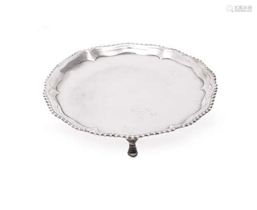 A George III silver shaped circular waiter by Richard Rugg I