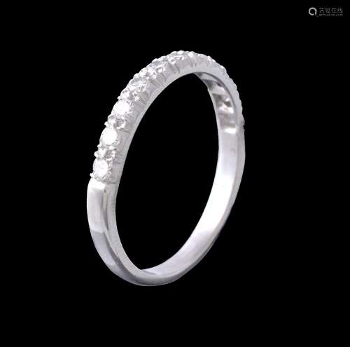 A diamond half eternity ring