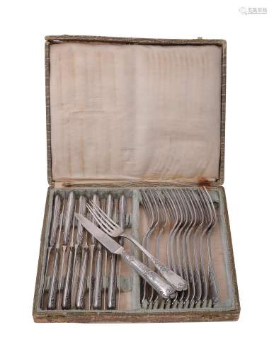 A set of twelve French silver dessert knives and forks by Charles Tirbour