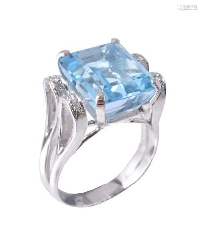 A blue topaz and diamond ring