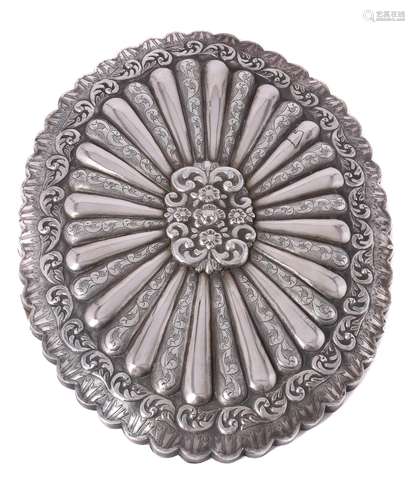 An Ottoman silver coloured small shaped oval mirror