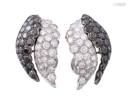 A pair of diamond and black diamond earrings