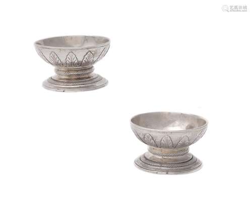 A pair of William IV silver circular pedestal salts by R. & S. Garrard & Co.