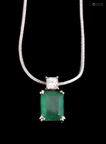 An emerald and diamond pendant