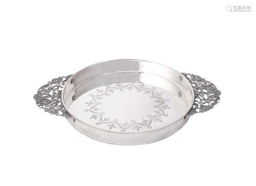 A Turkish silver coloured circular dish by Urart