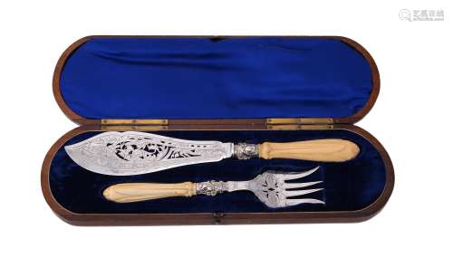 A pair of Victorian silver and ivory fish servers by Walker & Hall