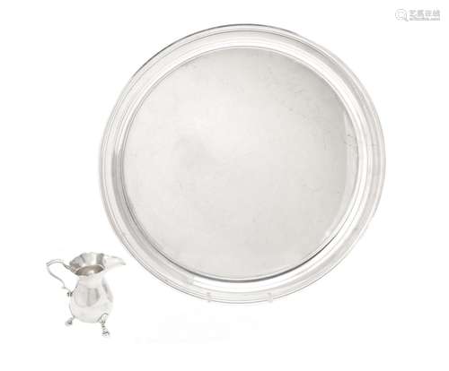 An American silver coloured circular tray by Tiffany & Co.