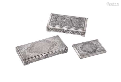 Three Iranian silver rectangular boxes