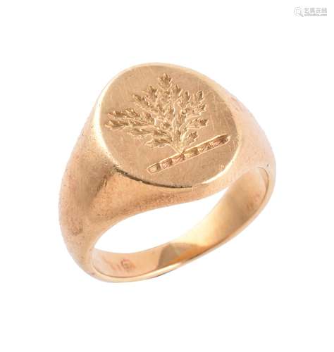 A gold coloured signet ring by Garrard