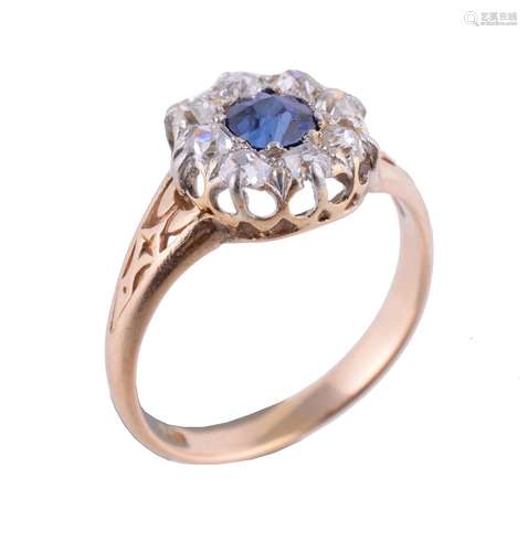 An early 20th century sapphire and diamond cluster ring