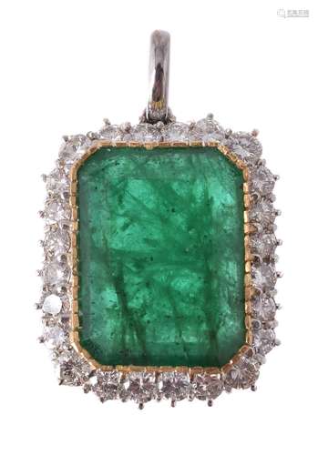 An emerald and diamond pendant