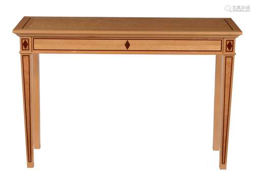 David Linley, a sycamore, ripple maple, and American walnut inlaid console table