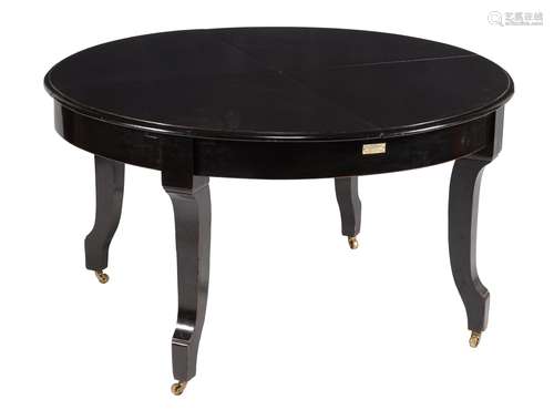 An ebonised mahogany metamorphic dining table