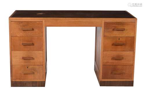 An Art Deco oak pedestal desk