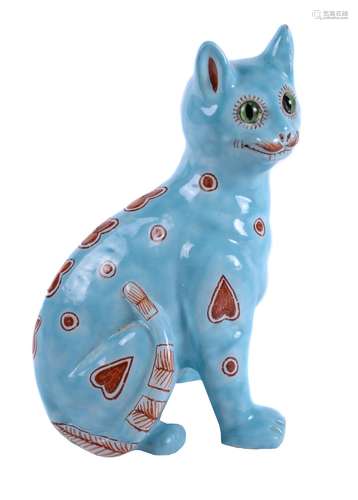 A Mosanic faience pottery model of a seated cat