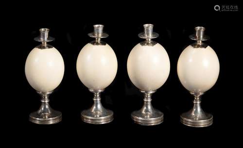 Four ostrich egg and nickel plated candle holders by Anthony Redmile