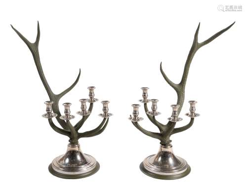 A pair of green painted antler and chromed metal mounted five light candelabra by Anthony Redmile