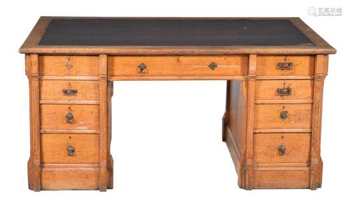 A Reformed Gothic oak twin pedestal desk