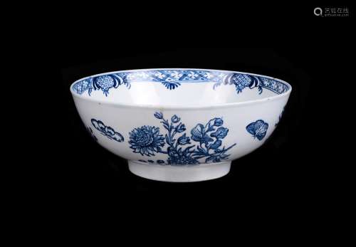 An English porcelain blue and white printed and painted punch bowl