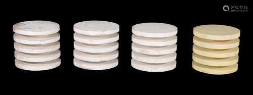 A set of four white painted hardwood occasional tables