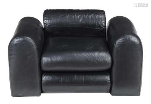 A black leather upholstered lounge armchair