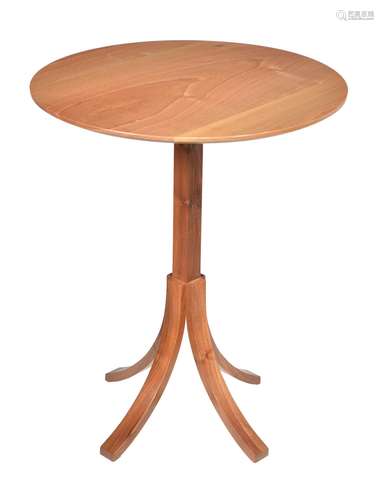 A walnut occasional table by Holgate and Pack