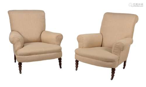 A pair of late Victorian oak and 'oatmeal' upholstered armchairs