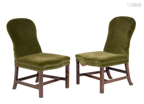 A harlequin pair of mahogany and upholstered side chairs