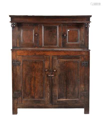 An oak court cupboard