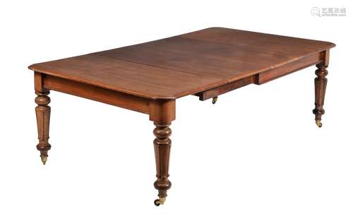 A Victorian mahogany extending dining table