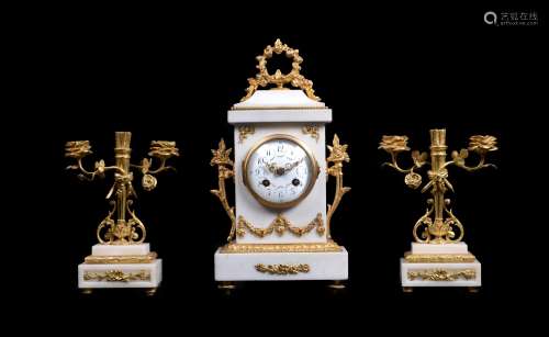 A white marble and ormolu mounted mantel clock