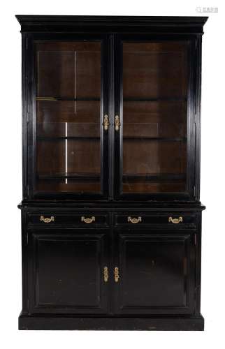 A Victorian ebonised cabinet bookcase