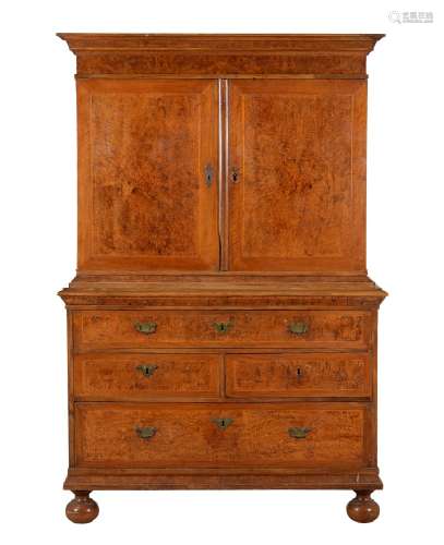 A walnut, burr walnut and crossbanded cabinet on chest