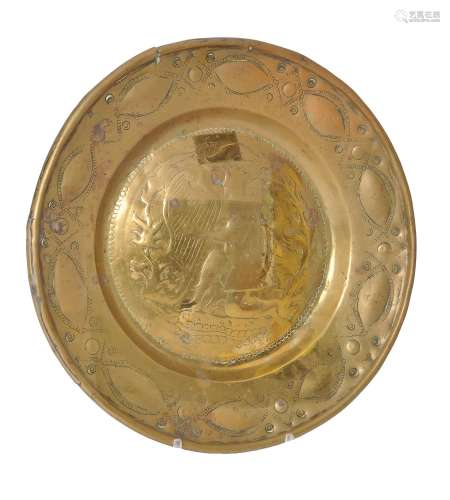 A Nuremberg brass alms dish, late 15th century