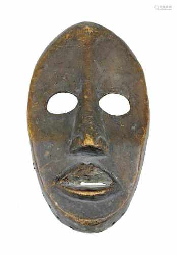 Gesichtsmaske der Dan, Côte d'Ivoire, helles Holz dunkel gefärbt, schmales Gesicht mit großen oval