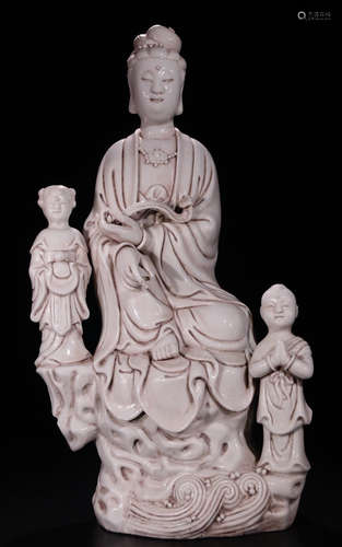 A WHITE GLAZE GUANYIN BUDDHA STATUE