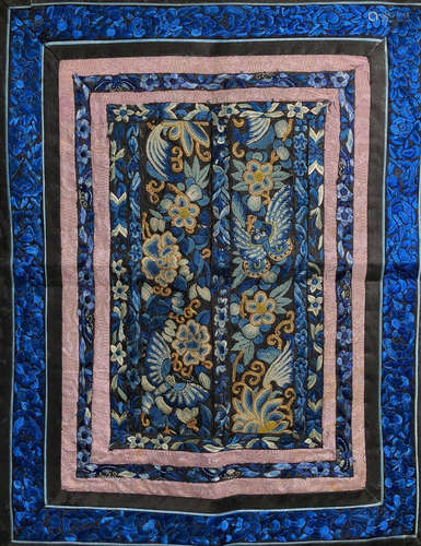 A BLUE EMBROIDERY WITH BUTTERFLY PATTERN