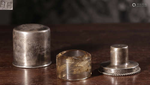 A CRYSTAL RING WITH SILVER BOX