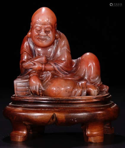 A SOAPSTONE CARVED ARHAT BUDDHA STATUE