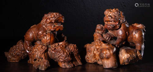 PAIR OF HUANGYANG WOOD CARVED LION ORNAMENT